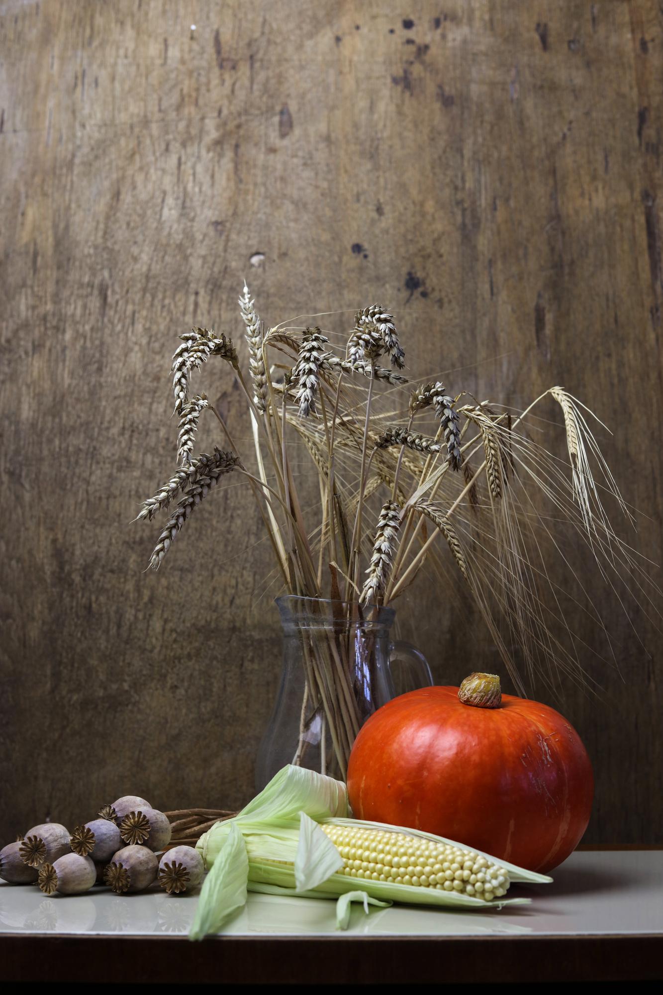 large editorial shot of a wooden table with seasonal produce